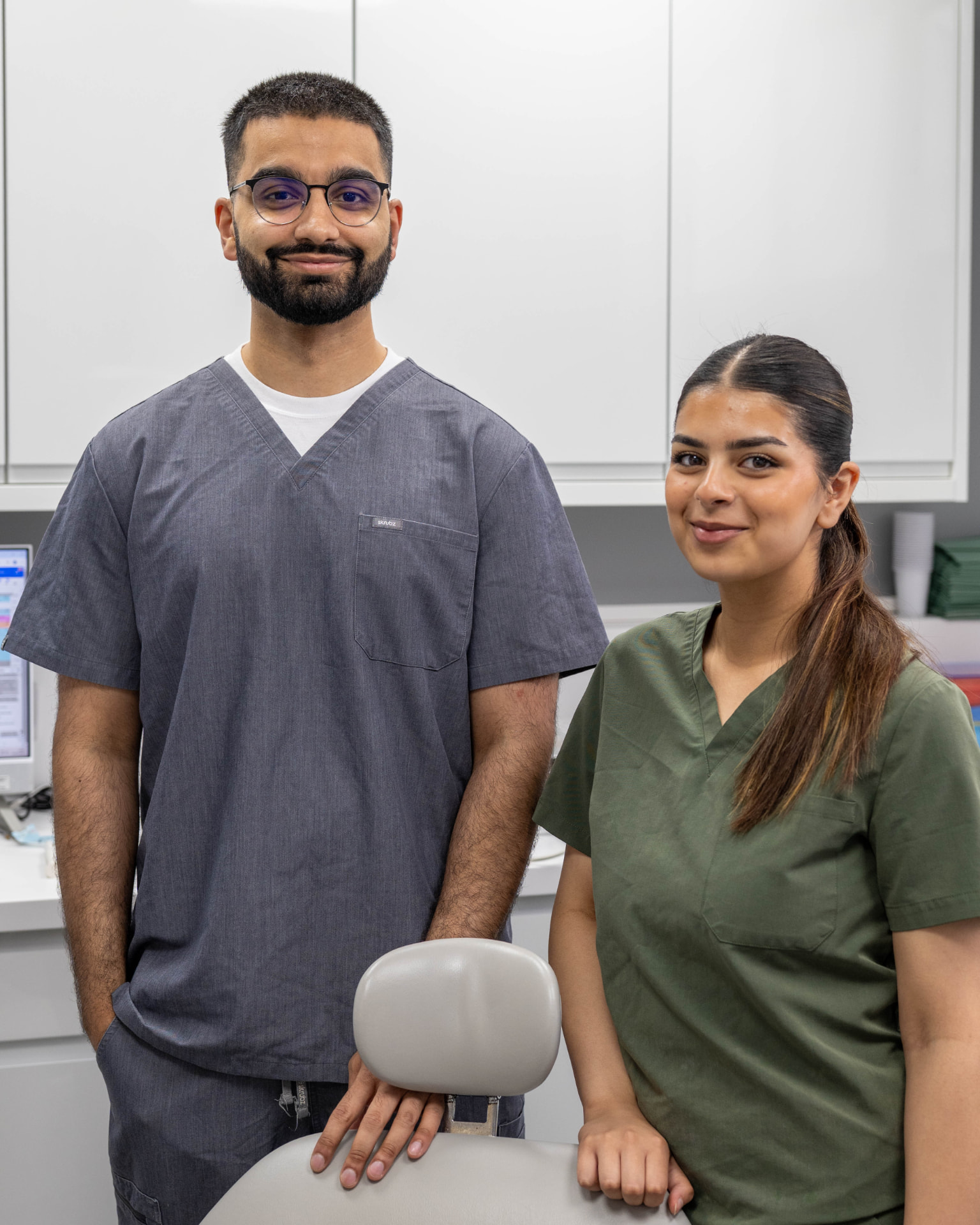Stable Court dentist and dental nurse in surgery